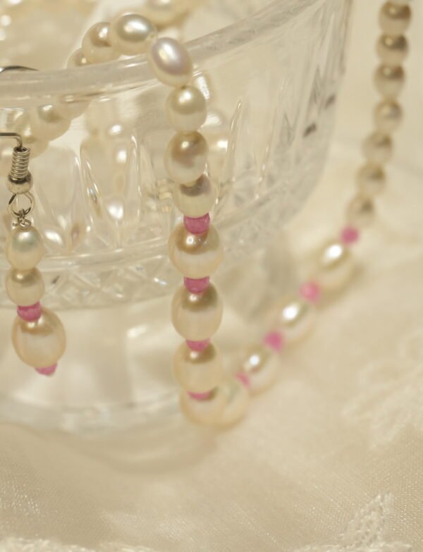 white and pink necklace